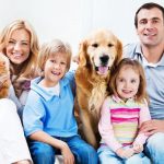 Happy Family with their Dog — Pest Experts in Torquay Hervey Bay, QLD